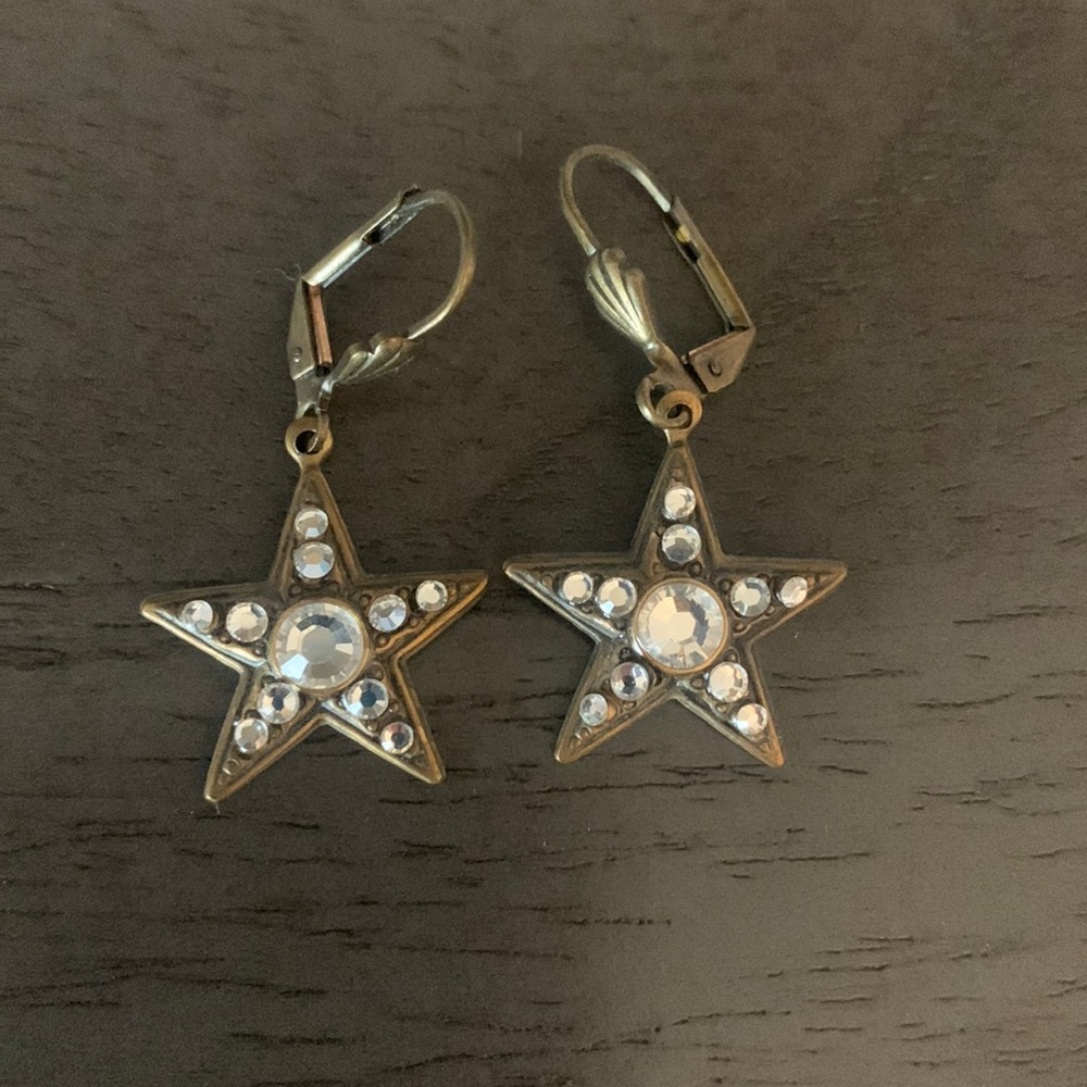 Star earrings pierced ears